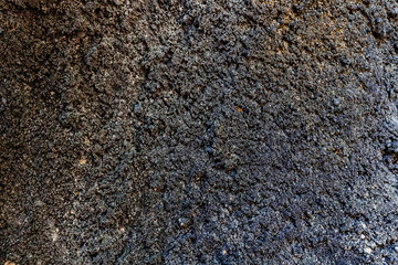 Dark grey black stone background or texture. black stone