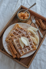 home made healthy cinnamon waffles with pear