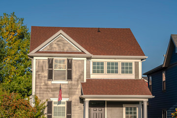 Traditional American townhouse with national flag day