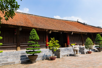 Obraz premium Beautiful scenery of Co Loa communal temple in ancient Co Loa citadel, Vietnam. Co Loa was capital of Au Lac (old Vietnam), the country was founded by Thuc Phan (An Duong Vuong) about 2nd century BC.