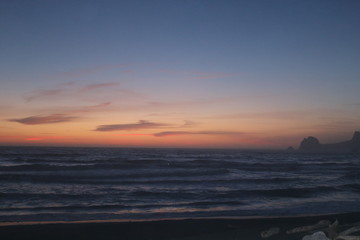 Fototapeta na wymiar Quietly Pink Sunset Over Ocean