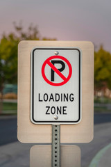 No Parking sign for vehicles for a Loading Zone