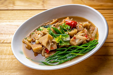 Jackfruit Curry,Northern Thai Food, Curry young jackfruit with fresh small tomato and green veggie,Jackfruit curry, local food in northern Thailand The food is delicious and spicy.
