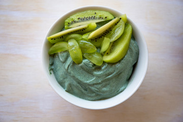 Spirulina smoothie bowl with green fruit