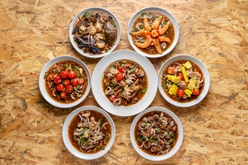 Yum, Spicy salad, spicy Thai food, mixed on the table,Collection set of Spicy salad (Yum Thai style) Traditional spicy -hot seafood, egg Thai food. Thai cuisine delicious food popular 