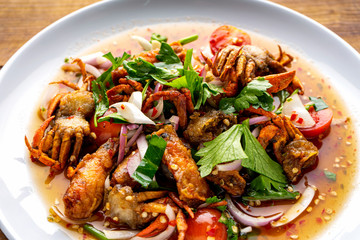 yum , salad,Three Crispy Salad, spicy salad ,Deep-fried shrimp head and fried crab to make salad.