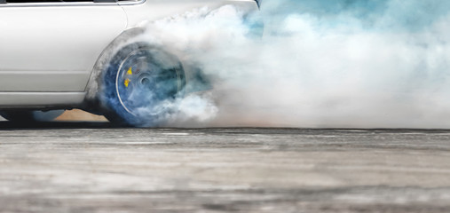 Race drift car burning tires on speed track - obrazy, fototapety, plakaty