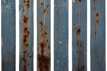 Set of vertical metal bar stripes or plates with gaps on white isolated background. Weathered painted elements with rustic spots and cracks