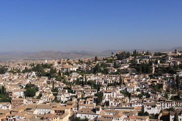 Aerial view of the Albaicin city taken from Tower of the Cubo (Cube Tower) of the historical Alhambra Palace complex in Granada, Andalusia, Spain.