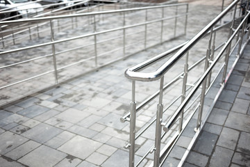 Shiny chrome metal fencing and railings.