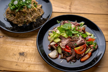 Beef salad,Spicy salad of roasted beef, Thai style food,Thai beef salad spicy dish.