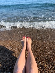 feet on the beach