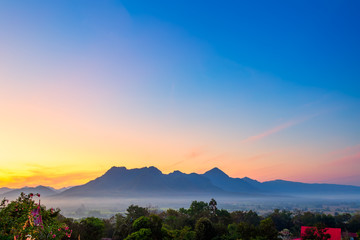 Fototapeta na wymiar Sunrise with the mist Beautiful landscape for relaxing in thailand