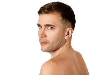 Fototapeta premium Young adult man of Caucasian appearance over white