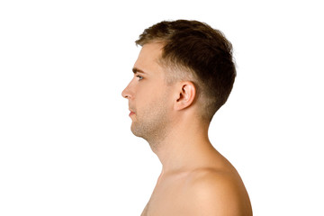 Portrait in profile of a young adult man of Caucasian appearance