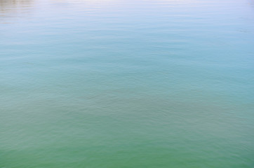 Fototapeta na wymiar Background texture of tranquil rippling water