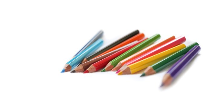 Colorful colored pencils close up, art supplies for painting education in classroom, kids stationary in school on white background, rainbow unicorn color, diversity,happy life, gay pride, lgbt concept