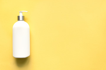 White Dispenser on Yellow