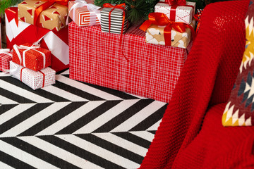 Pile of wrapped presents under the Christmas tree