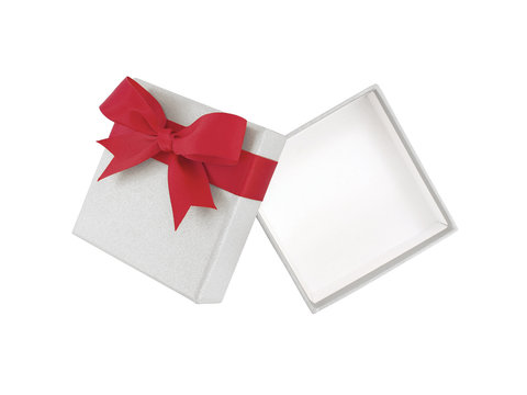 open empty grey gift box with red ribbon bow wrapped around lid isolated on white background, cardboard box wrapped with luxury gray paper and simple tied bow for put presents, flat lay top view