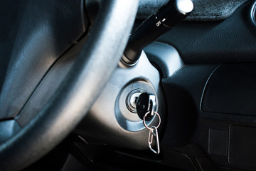 Close up to the car keys in the car to start the engine.