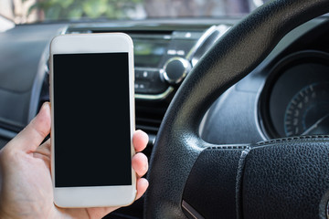 The driver uses the phone while driving. Isolated screen for mockup. Concept of using a car phone.