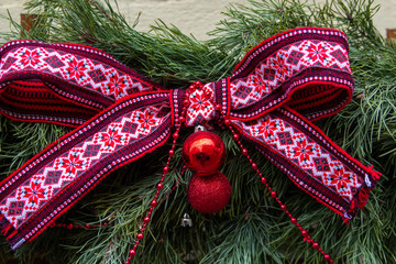 Christmas embroidered bow,embroidered red Christmas bow on the branches of the Christmas tree