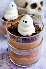 Halloween ghost chocolate dessert in glass for kids party