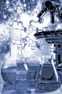 Abstract 3d image of DNA chain, laboratory equipment on a blurred background with chemical formulas.