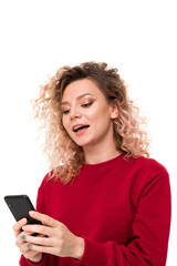 Fototapeta premium Caucasian girl with curly fair hair chatting with friends and laughing