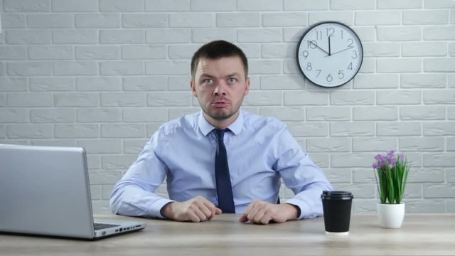 Angry businessman screaming. Aggressive boss threatens violence. Stress at work.