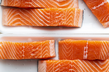 fresh salmon, cut into pieces and ready for cooking. fish cutting