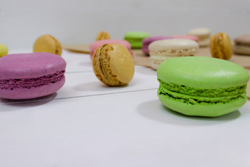 colorful macaroons on white background