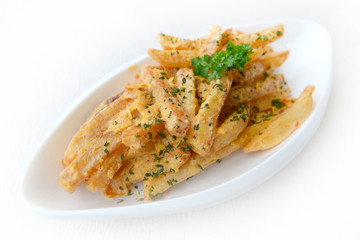 French fries seasoned with Salted Egg on the white plate.
