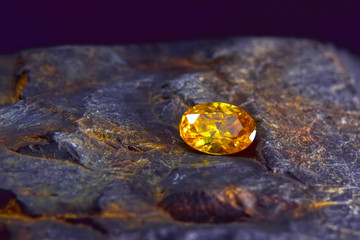 Yellow gemstone is a natural gemstone that has been cut through Is an expensive gem