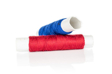 Group of two whole sewing thread spool isolated on white background