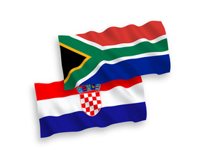 Naklejka premium National vector fabric wave flags of Croatia and Republic of South Africa isolated on white background. 1 to 2 proportion.