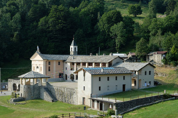 Fototapeta na wymiar View of the Sanctuary of Sanctuary Madonna the Prascondu in Piedmont, Italy near Ribordone