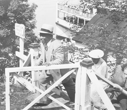 Father Divine enters new 'Heaven' at Krum Elbow, N.Y. with 3000 followers. Aug. 9, 1938. Howland