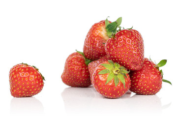 Lot of whole fresh red strawberry isolated on white background