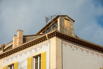 colorful facade of a house in the historic district of the city of Frejus, resort city on the Cote d'Azur in France