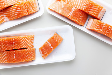 fresh salmon, cut into pieces and ready for cooking. fish cutting