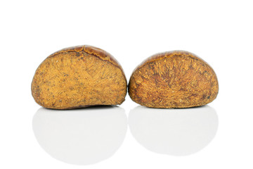 Group of two whole sweet brown chestnut isolated on white background