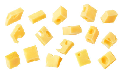 Hard cheese cubes fall isolated on white background