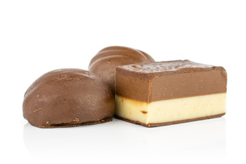 Group of three whole delicious chocolate praline isolated on white background