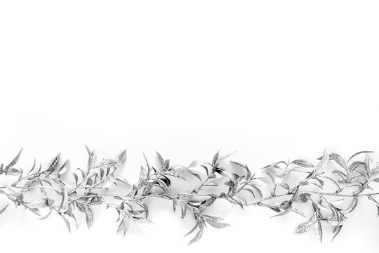Christmas Border with Silver Leaves on White Background