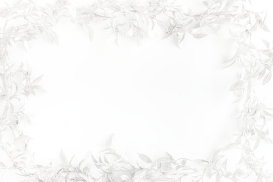 Christmas Frame with Silver Leaves on White Background