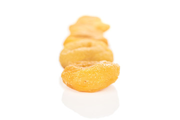 Group of five whole dried orange apricot isolated on white background