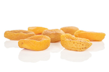 Lot of whole dried orange apricot isolated on white background