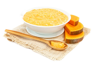 Pumpkin porridge on white background. Healthy eating.